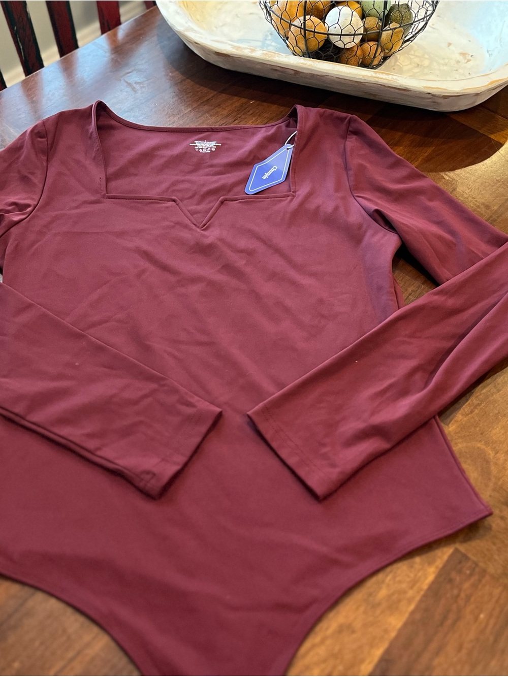Women's Long-Sleeve Scoop Notch Thong Bodysuit in Burgundy